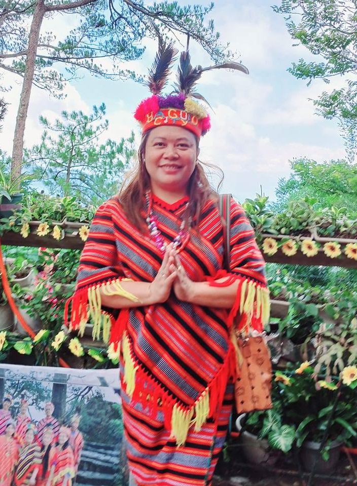 Rose Travel and Tours client in traditional attire